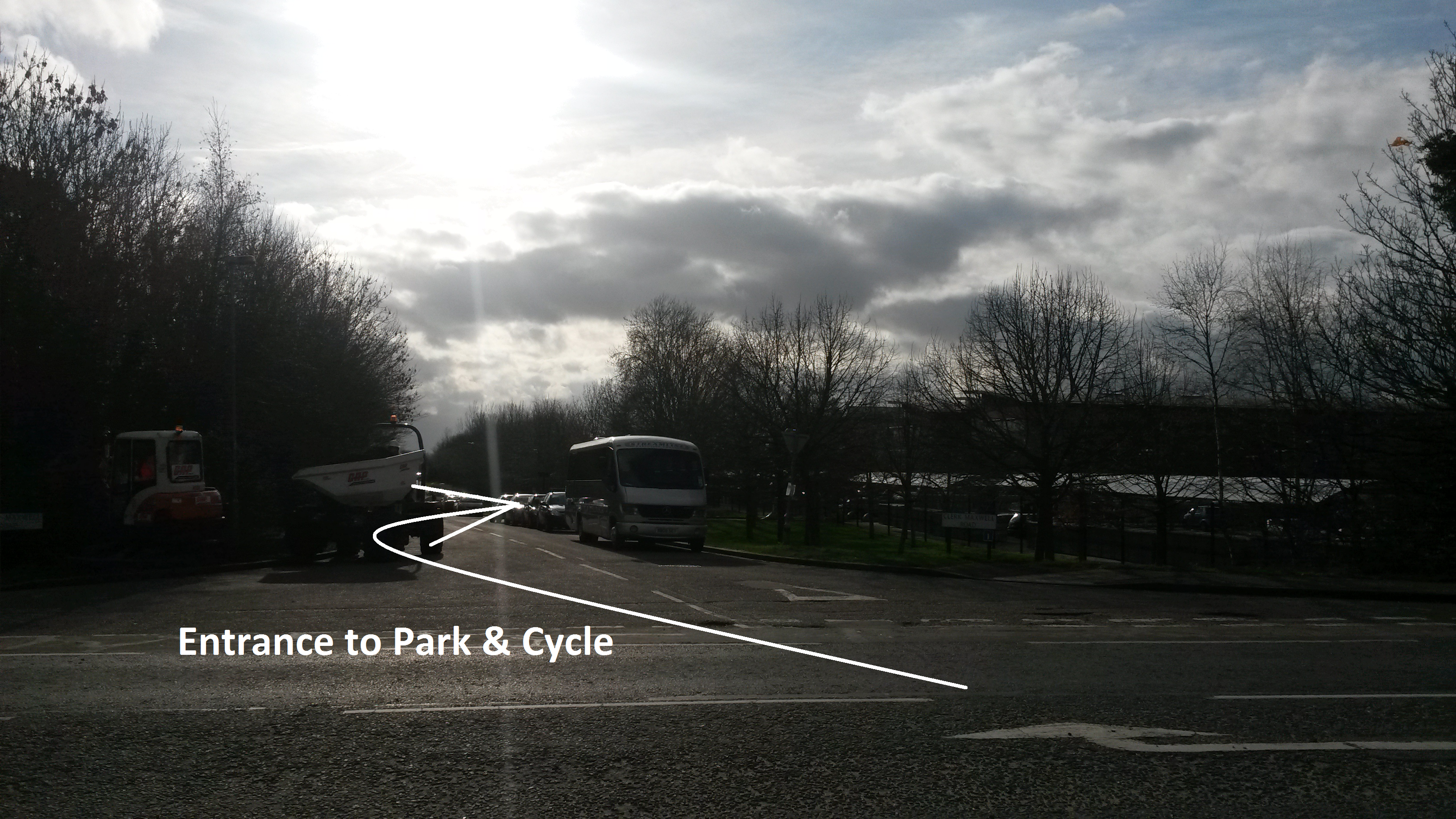 Entrance to Clerk Maxwell Road. The Park & Cycle is on the right.